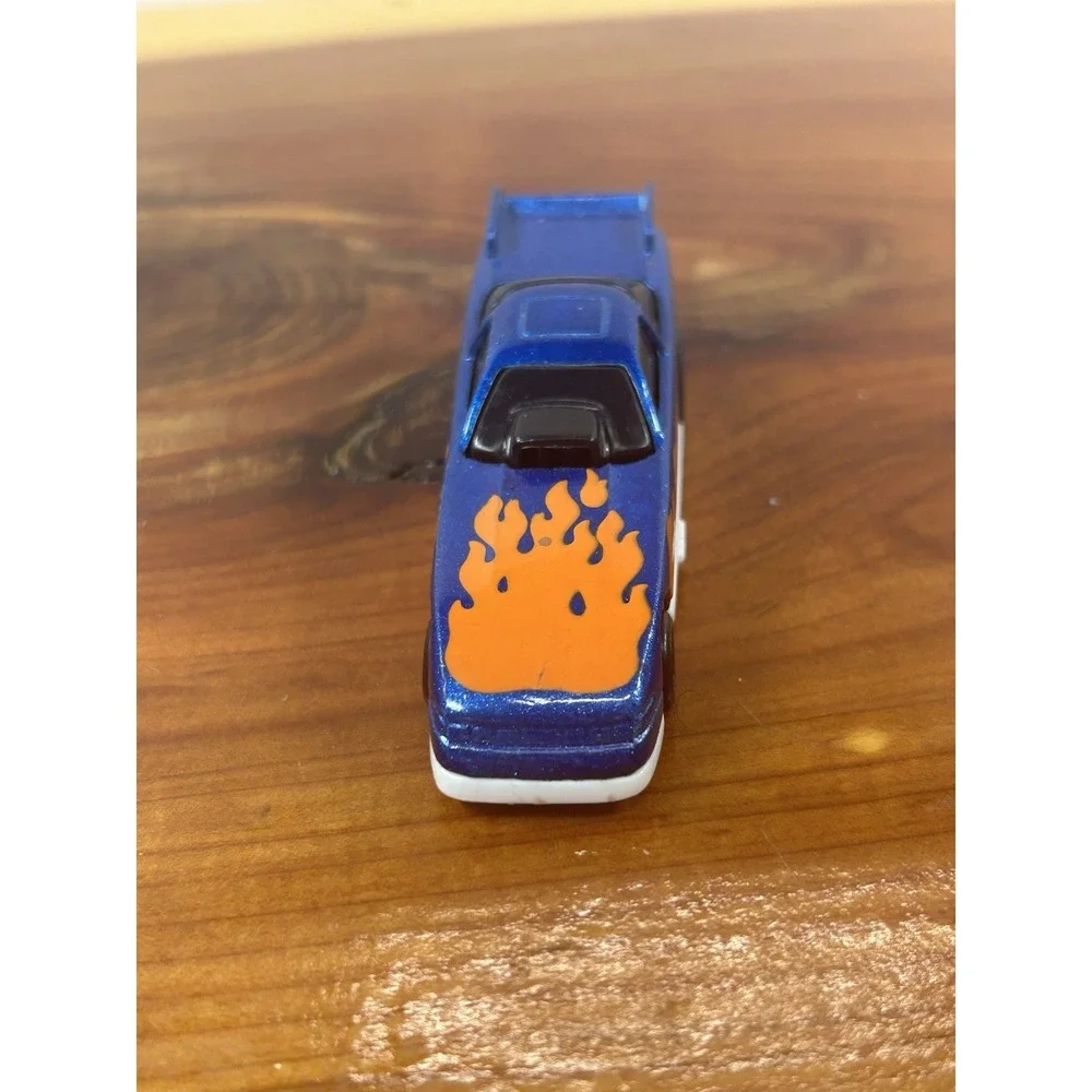 Hot Wheels 1993 MC 20 loose diecast racecar usually beat 20 cars